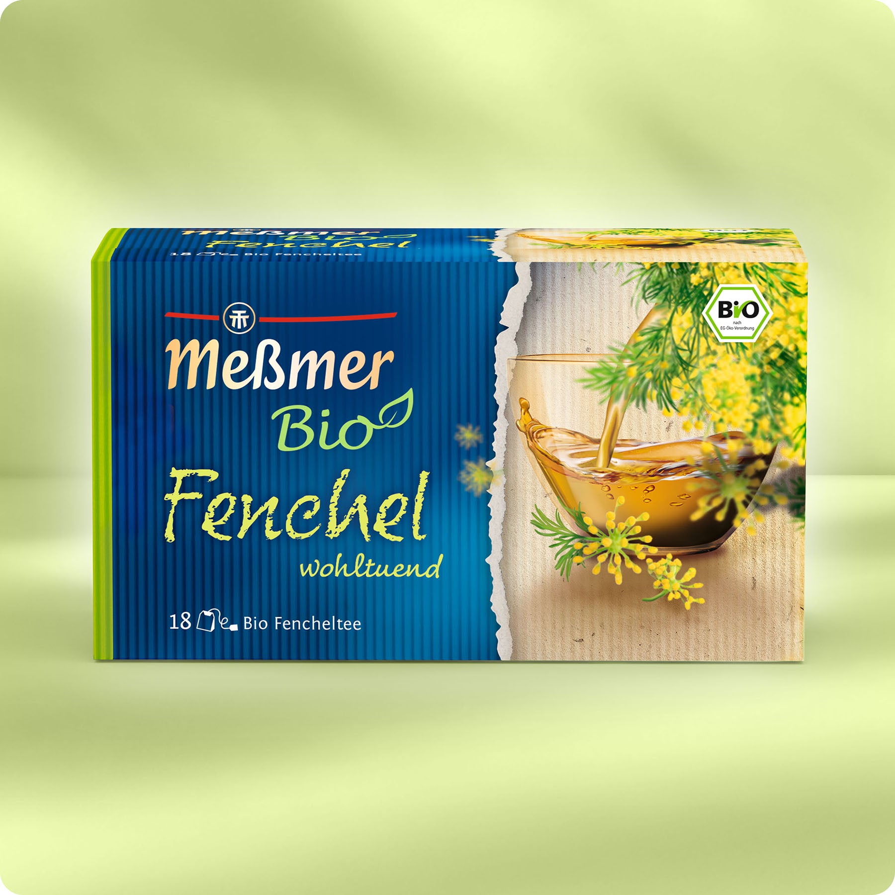 Eine Schachtel Meßmer DE Bio Fenchel-Tee im blau-grünen Design, mit einer Glastasse und Fenchel auf der Vorderseite. Enthält 18 Beutel und weist die Bio-Zertifizierung auf.