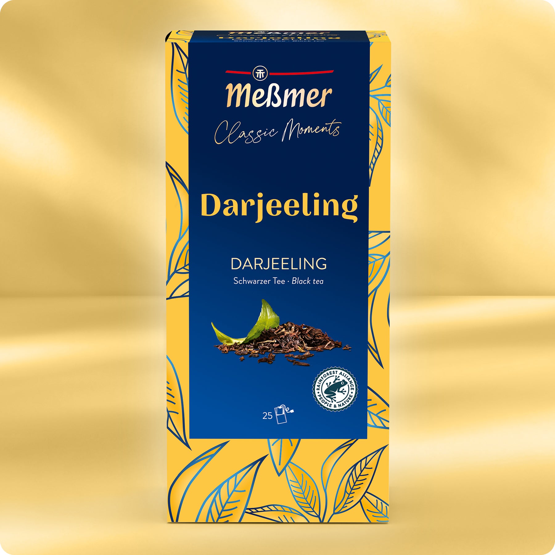 Eine Schachtel Meßmer DE Darjeeling-Tee ist in Gelb und Blau verpackt, mit Blattmustern und Abbildungen von losem Tee und einem grünen Blatt, die die Herkunft aus dem Hochlandklima-Darjeeling hervorheben.
