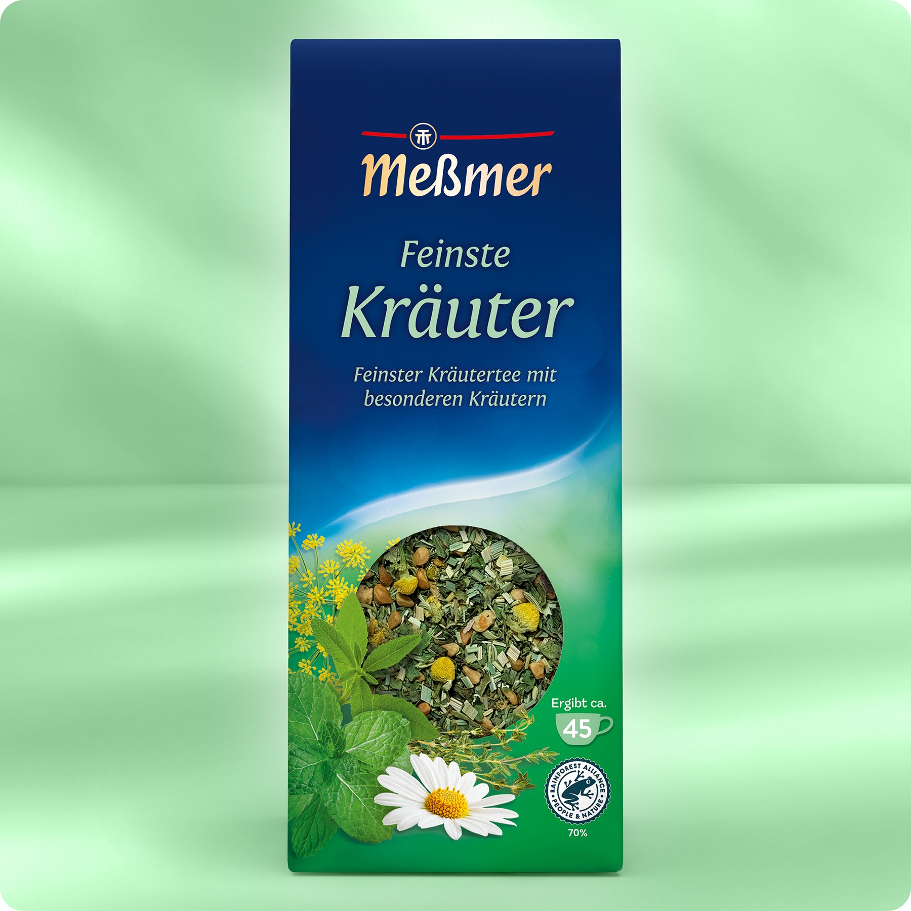 Schachtel Meßmer DE Feinste Kräuter mit Abbildungen von Kamille, Pfefferminze und Kräutern auf einem grünen Hintergrund mit Farbverlauf.