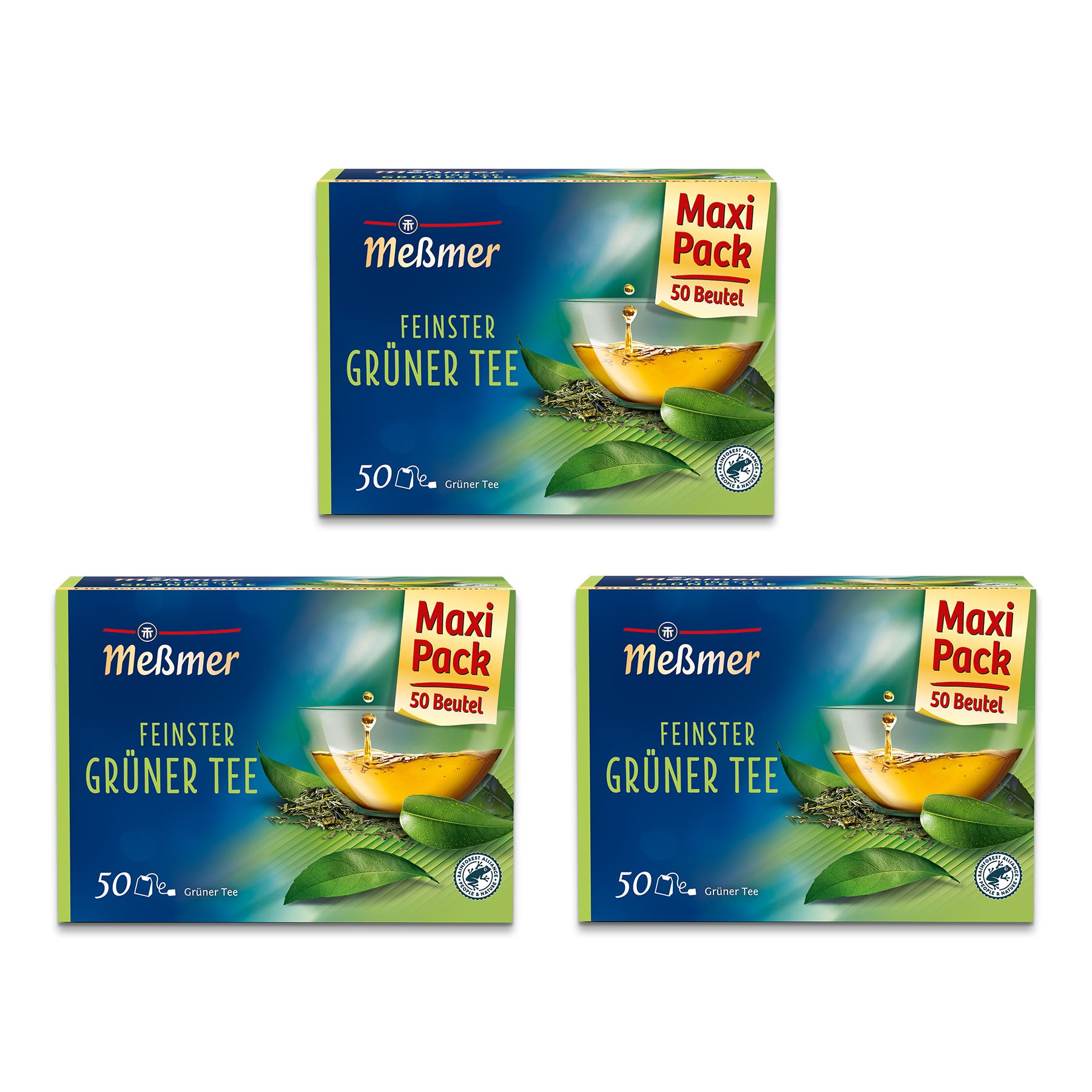 Drei Schachteln Meßmer Feinster Grüner Tee Maxi Pack mit je 50 Teebeuteln. Die Verpackung ist grün mit der Abbildung einer Teetasse und grünen Teeblättern.