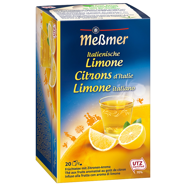 Verpackung von Meßmer Italienische Limone Früchtetee mit Zitronenscheiben und Teeglas vor sonnigem Hintergrund, einladend und frisch.