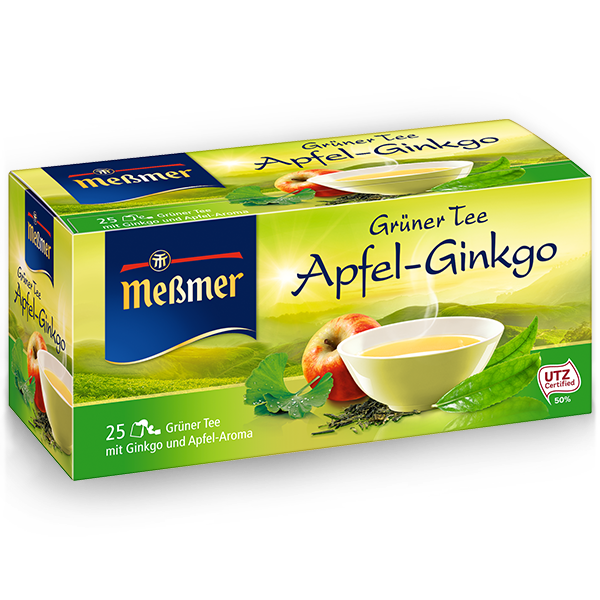 Packung Grüner Tee Apfel-Ginkgo mit dampfender Tasse Tee, Apfel und Ginkgoblätter, Produktkontext Sanddorn-Erdbeere sichtbar auf dem Bild