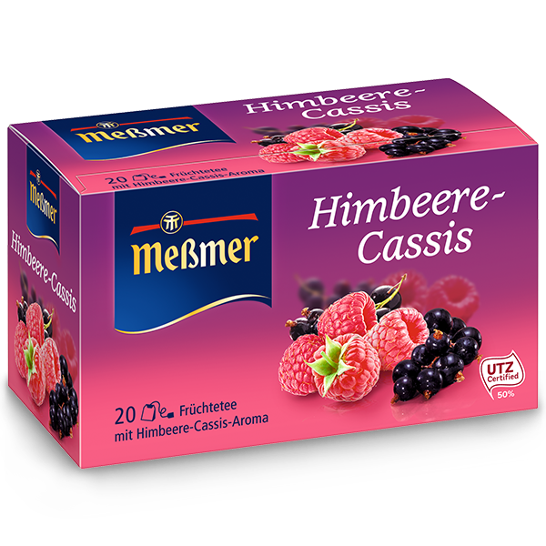 Verpackung eines Früchtetees mit Himbeere- und Cassis-Geschmack, rosa-lila Design, Meßmer Marke und Beerenabbildungen, Produktname Heidelbeere-Kokos sichtbar auf Bild